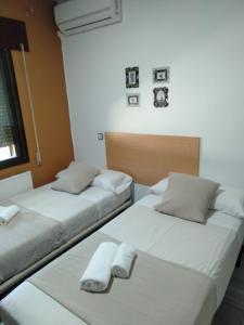 Postel nebo postele na pokoji v ubytování New Hortaleza Coliving
