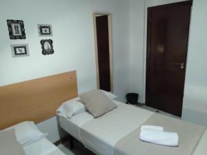 Postel nebo postele na pokoji v ubytování New Hortaleza Coliving