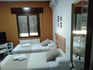 Postel nebo postele na pokoji v ubytování New Hortaleza Coliving