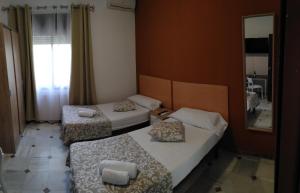 Postel nebo postele na pokoji v ubytování New Hortaleza Coliving
