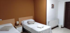 Postel nebo postele na pokoji v ubytování New Hortaleza Coliving
