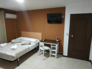 Postel nebo postele na pokoji v ubytování New Hortaleza Coliving