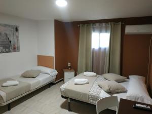 Postel nebo postele na pokoji v ubytování New Hortaleza Coliving