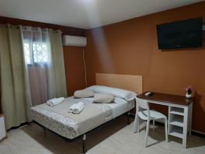 Postel nebo postele na pokoji v ubytování New Hortaleza Coliving