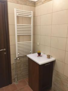 a bathroom with a sink and a shower at Villa Periklis Madytos 1st Floor Independent House in Néa Mádhitos