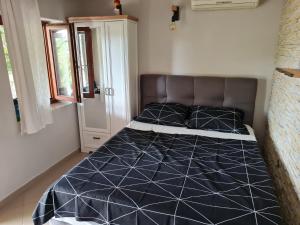 Postel nebo postele na pokoji v ubytování Studio apartment Ivan