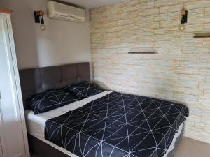 Postel nebo postele na pokoji v ubytování Studio apartment Ivan