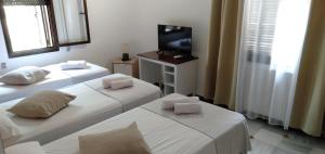 Postel nebo postele na pokoji v ubytování New Hortaleza Coliving