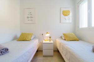 Ένα ή περισσότερα κρεβάτια σε δωμάτιο στο Lovely apartment with seaview +17 φωτογραφίες