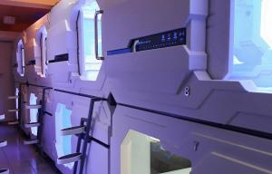 Kuchyň nebo kuchyňský kout v ubytování Bestow Capsule Hostel