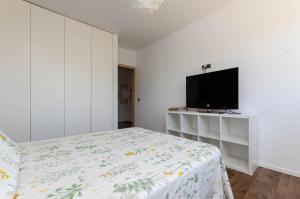 YourHouse Casa Llubi, air conditioned town house in Majorca north tesisinde bir odada yatak veya yataklar
