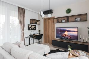 A television and/or entertainment centre at Downtown Penthouse Budapest