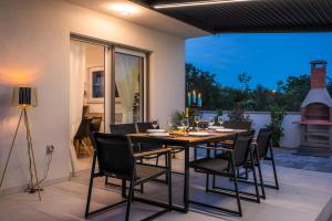 Patio alebo iná vonkajšia časť ubytovania VILLA PRESTIGE
