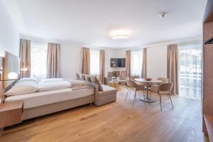 Un pat sau paturi într-o cameră la das mondsee