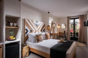 Postel nebo postele na pokoji v ubytování Indigo Inn Casa Adults Only + 37 fotografií