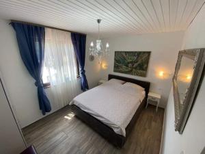 Postel nebo postele na pokoji v ubytování Villa Forko