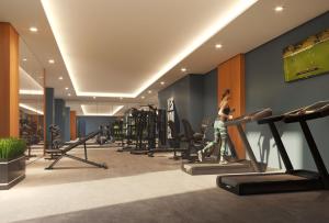 Fitness centrum a/nebo fitness zařízení v ubytování Trendy Modern Tower Apartment with Private Parking Space