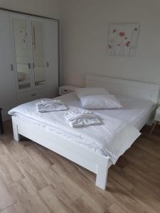 Postel nebo postele na pokoji v ubytování Hotel & Restaurant Ada