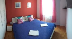 Posteľ alebo postele v izbe v ubytovaní Apartment Rubin