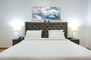 Postel nebo postele na pokoji v ubytování Maple Homes
