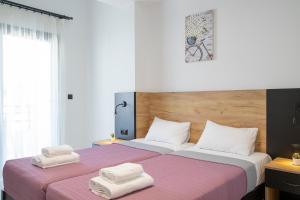 Postel nebo postele na pokoji v ubytování Villa Chrisanthi