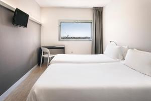 Posteľ alebo postele v izbe v ubytovaní B&B HOTEL Albacete