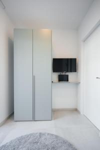 Televízia a/alebo spoločenská miestnosť v ubytovaní Villa Lonely Place