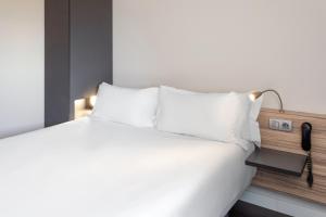 Posteľ alebo postele v izbe v ubytovaní B&B HOTEL Albacete