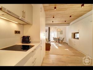 Virtuvė arba virtuvėlė apgyvendinimo įstaigoje AUDETH de Alma de Nieve