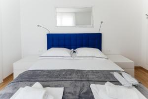 Posteľ alebo postele v izbe v ubytovaní Villa Lonely Place