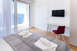 Posteľ alebo postele v izbe v ubytovaní Villa Lonely Place