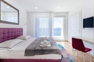 Posteľ alebo postele v izbe v ubytovaní Villa Lonely Place + 37 fotografií