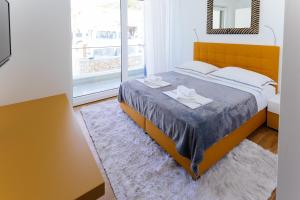 Posteľ alebo postele v izbe v ubytovaní Villa Lonely Place