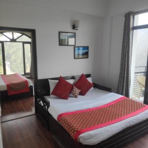 Cama o camas de una habitación en Tethys Himalaya Narkanda