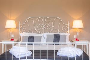 Ein Bett oder Betten in einem Zimmer der Unterkunft Luxusfinca Son Mas
