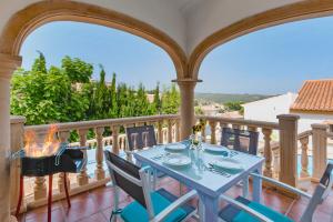 A balcony or terrace at Villa Aneto by Villa Plus