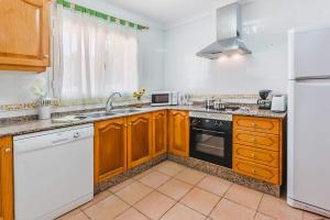 Kuchyň nebo kuchyňský kout v ubytování Villa Aneto by Villa Plus