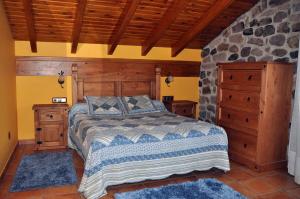 سرير أو أسرّة في غرفة في Casa TINUCA