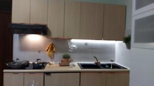 Kuchyňa alebo kuchynka v ubytovaní Appartamento incantevole con ampio balcone