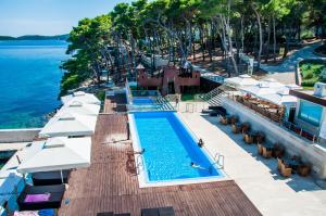 Bazén v ubytování Hotel Maxim nebo v jeho okolí