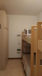 Posteľ alebo postele v izbe v ubytovaní Appartamento incantevole con ampio balcone