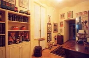 a living room filled with furniture and a room with at Vacanze Romane in Rome