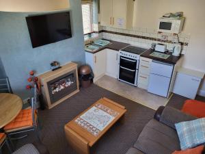 an overhead view of a kitchen with a fireplace at Cleveland Court Apartments in Blackpool
