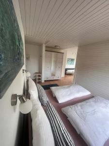 Wörthersee Appartements Lexにあるベッド