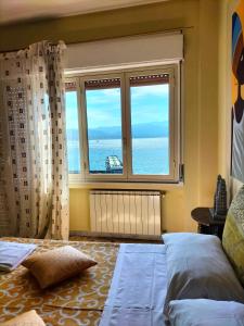 Postel nebo postele na pokoji v ubytování B&B Il MappaMondo