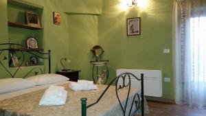 Postel nebo postele na pokoji v ubytování B&B Dhafna