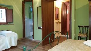 Postel nebo postele na pokoji v ubytování B&B Dhafna
