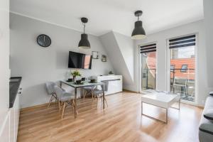 Posedenie v ubytovaní Apartment Różana Poznań by Noclegi Renters