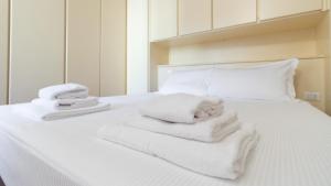 A bed or beds in a room at Italianway - Garibaldi 40