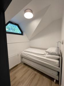 Postel nebo postele na pokoji v ubytování Golte - A2 Apartment - ski in/Out